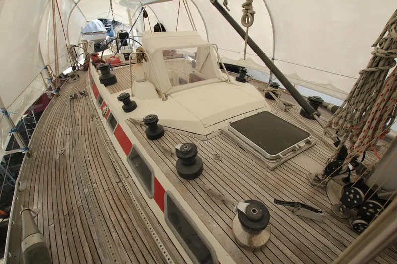 Le Reve Yacht Photos Pics 1983 Nautor Swan 46mkI sailboat deck with winches and rigging under cover.