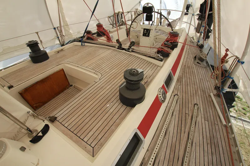Le Reve Yacht Photos Pics 1983 Nautor Swan 46mkI sailboat deck with wooden finish and rigging details.