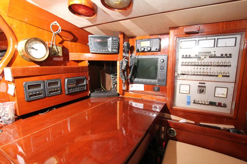 Le Reve Yacht Photos Pics Navigation station of 1983 Nautor Swan 46mkI yacht with instruments and control panel.