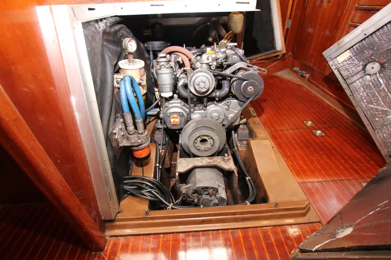 Le Reve Yacht Photos Pics Engine compartment of 1983 Nautor Swan 46mkI yacht, showcasing mechanical components.