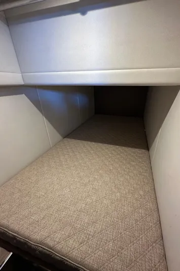 Reel Salty Yacht Photos Pics Interior cabin of 2020 Coastal Craft 33 ProFish, featuring a cozy sleeping area.