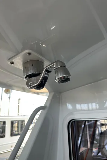 Reel Salty Yacht Photos Pics Ceiling-mounted light fixture inside a 2020 Coastal Craft 33 ProFish boat.