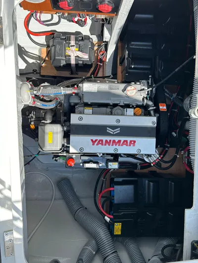  Yacht Photos Pics Engine compartment of a 2024 Lagoon 42 catamaran featuring a Yanmar engine.