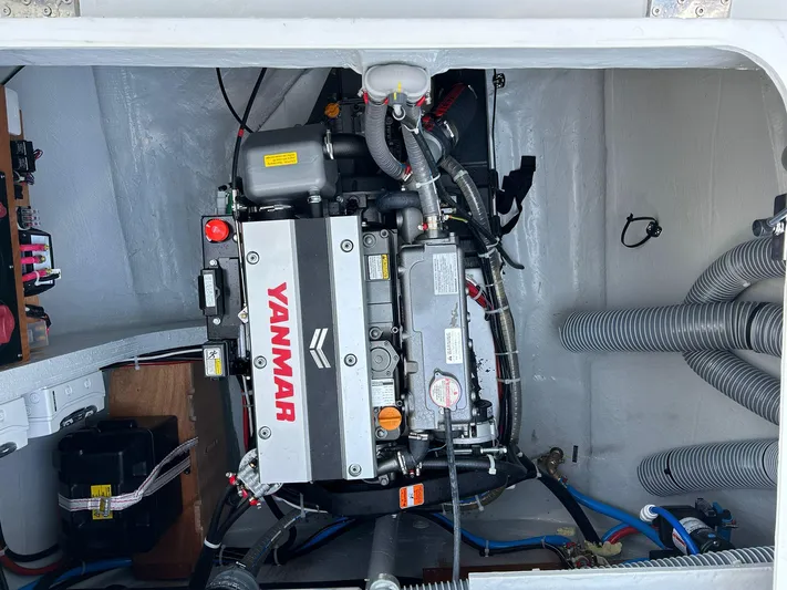  Yacht Photos Pics Engine compartment of a 2024 Lagoon 42 catamaran with a Yanmar engine.