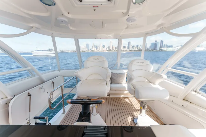  Yacht Photos Pics Interior of 2005 Sea Ray 550 Sedan Bridge yacht with city skyline view.