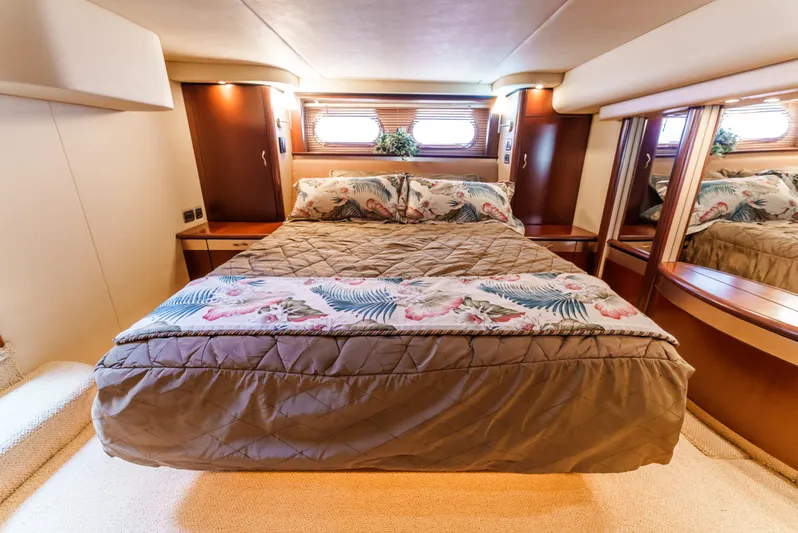  Yacht Photos Pics Luxurious bedroom interior of 2005 Sea Ray 550 Sedan Bridge yacht.