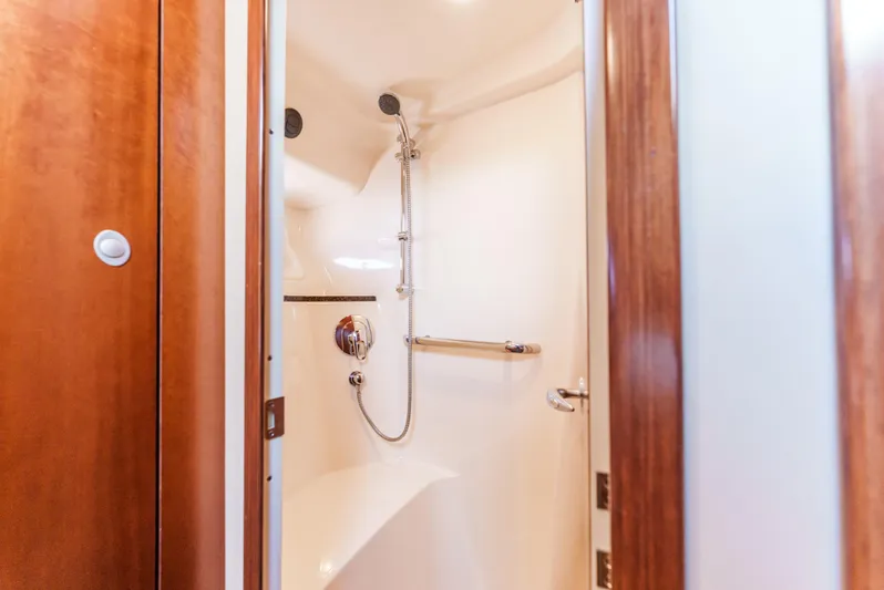  Yacht Photos Pics Luxurious shower in 2005 Sea Ray 550 Sedan Bridge yacht, featuring sleek design and modern fixtures.