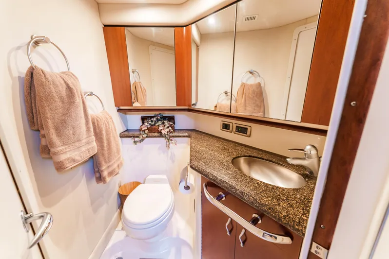  Yacht Photos Pics Luxurious bathroom in 2005 Sea Ray 550 Sedan Bridge yacht with elegant fixtures.