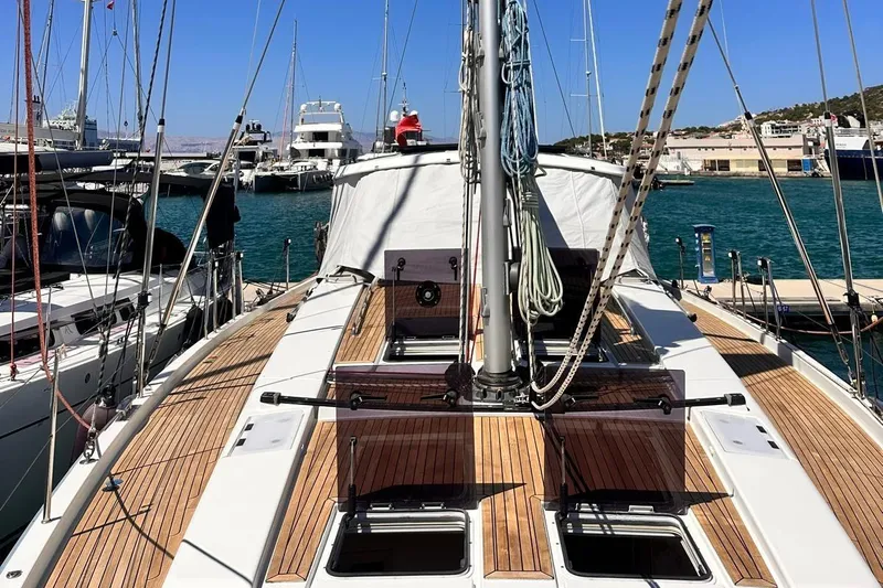  Yacht Photos Pics 2018 Hanse 548 yacht docked at marina, showcasing sleek deck design and rigging.
