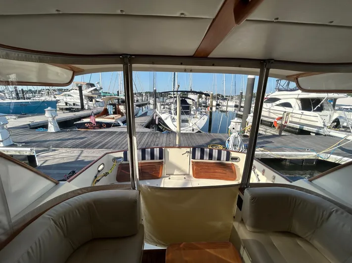 Freedom Yacht Photos Pics Interior view of a 2008 Legacy 32 yacht docked at a marina.