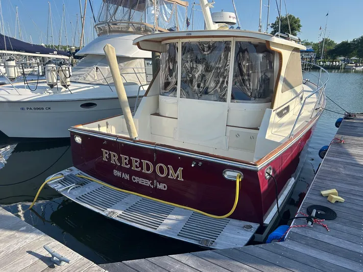 Freedom Yacht Photos Pics Legacy 32 boat named "Freedom" docked at Swan Creek, MD, 2008 model.