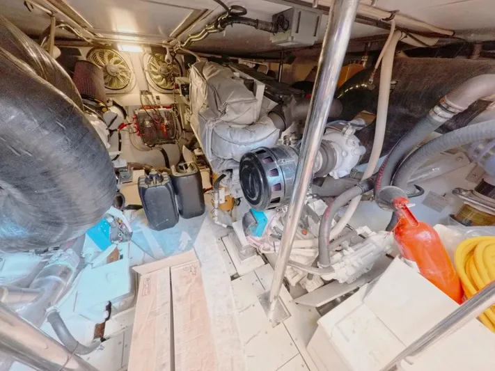  Yacht Photos Pics Engine room of a 2010 Azimut 64 yacht, showcasing machinery and equipment.