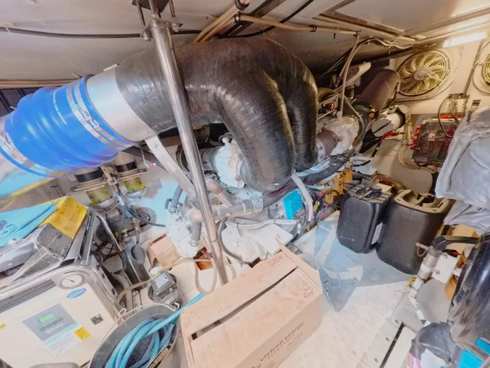  Yacht Photos Pics Engine room of a 2010 Azimut 64 yacht, featuring complex machinery and equipment.