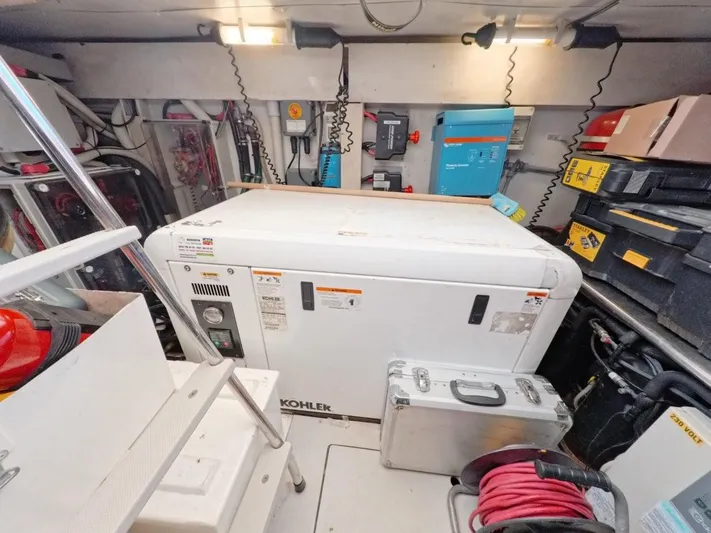  Yacht Photos Pics Engine room of a 2010 Azimut 64 yacht with Kohler generator and equipment.