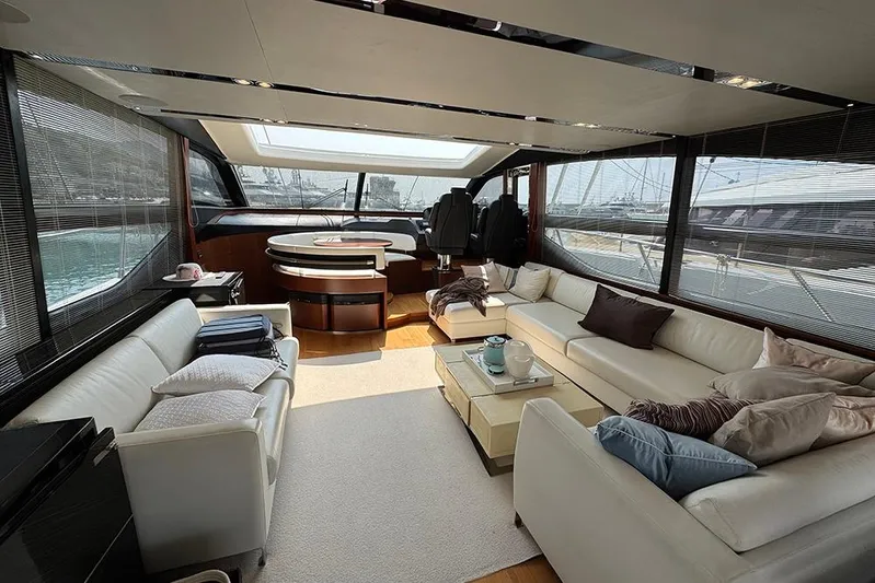  Yacht Photos Pics Luxurious interior of 2016 Princess S72 yacht with elegant seating and panoramic windows.