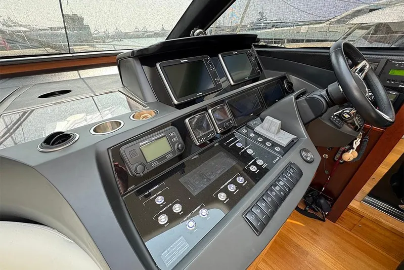  Yacht Photos Pics Helm of 2016 Princess S72 yacht with advanced navigation controls and displays.