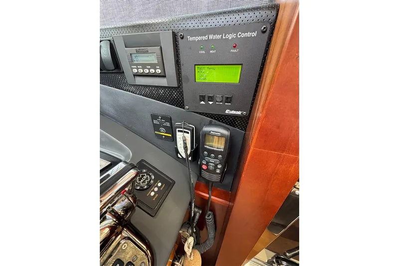  Yacht Photos Pics Control panel of a 2016 Princess S72 yacht with temperature and communication devices.