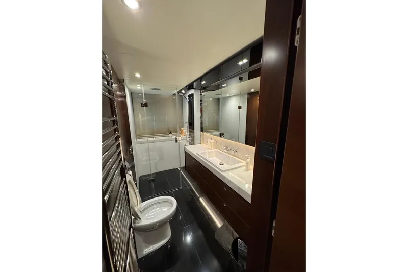  Yacht Photos Pics Luxurious bathroom in 2016 Princess S72 yacht with modern fixtures and elegant design.