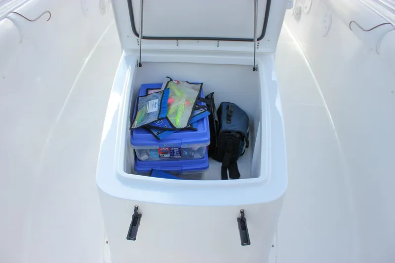  Yacht Photos Pics 2018 Sea Hunt Gamefish 30 storage compartment with fishing gear and tackle boxes.