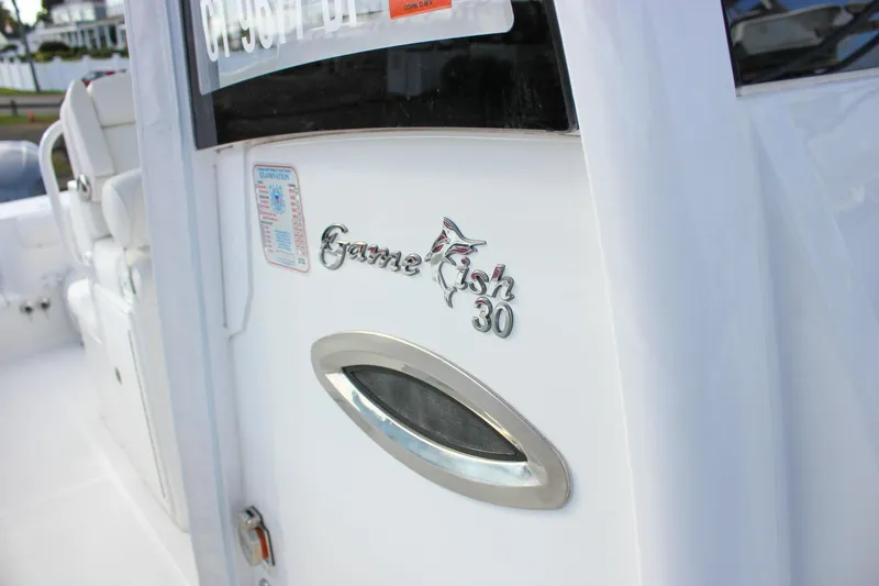  Yacht Photos Pics 2018 Sea Hunt Gamefish 30 boat, close-up of logo and design details.
