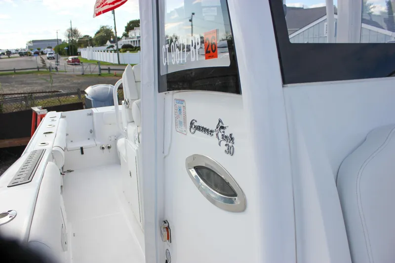  Yacht Photos Pics 2018 Sea Hunt Gamefish 30 boat interior with seating and logo detail.