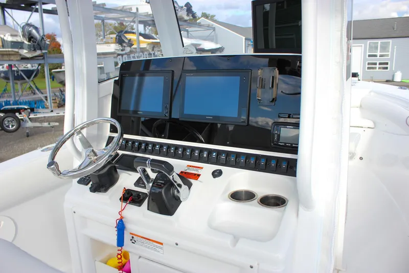 Yacht Photos Pics 2018 Sea Hunt Gamefish 30 helm with dual screens and modern controls.