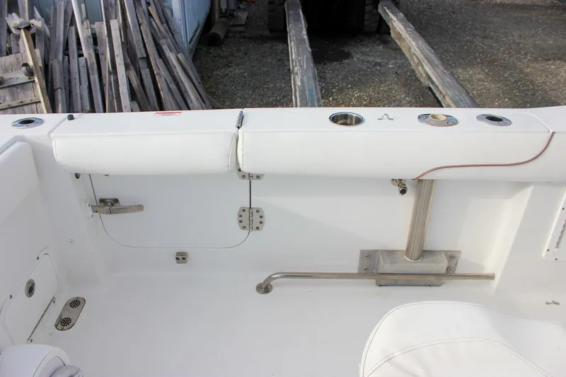  Yacht Photos Pics 2018 Sea Hunt Gamefish 30 boat interior with rod holders and seating.