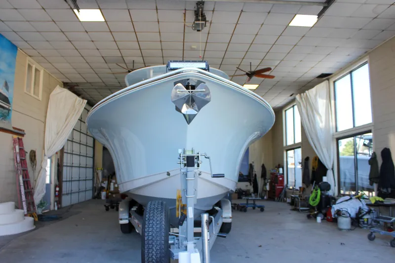 Yacht Photos Pics 2018 Sea Hunt Gamefish 30 boat in a garage, front view.