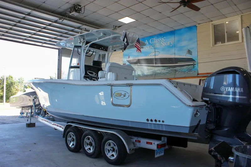  Yacht Photos Pics 2018 Sea Hunt Gamefish 30 boat in garage with Yamaha engine.