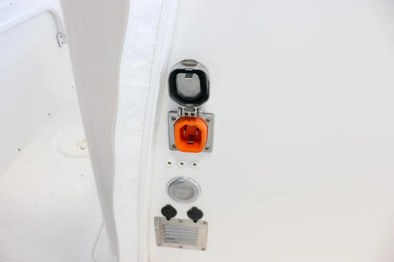  Yacht Photos Pics 2018 Sea Hunt Gamefish 30 boat electrical outlet and controls on white panel.