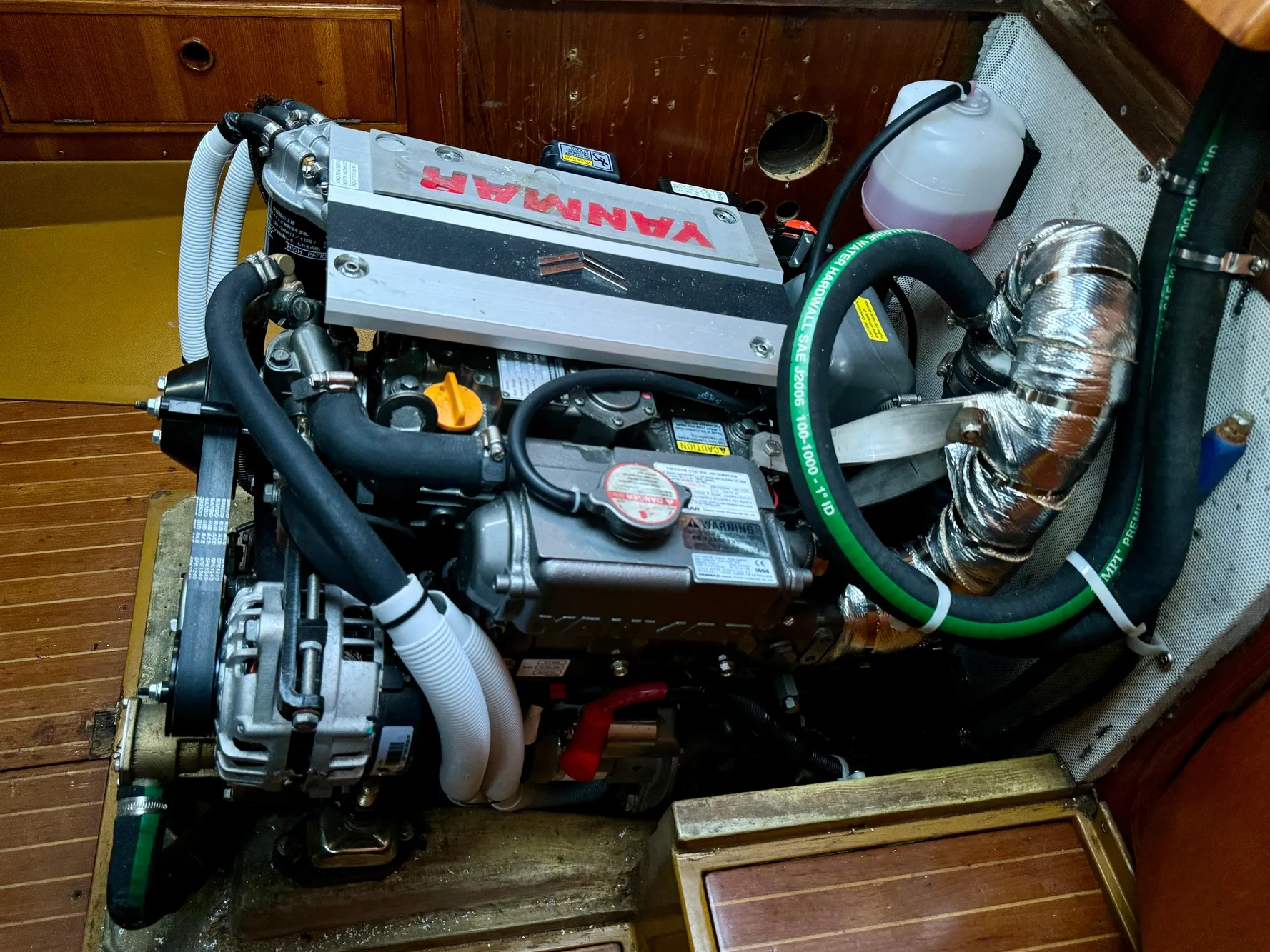 Engine compartment of a 1974 Nautor Swan 38 sailboat with Yanmar engine.