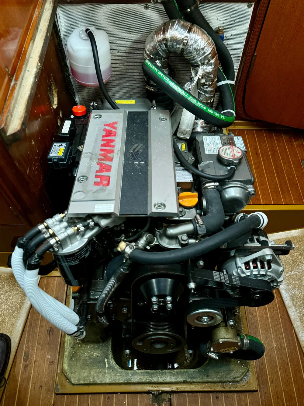 Yanmar engine in a 1974 Nautor Swan 38 sailboat, showcasing detailed mechanical components.