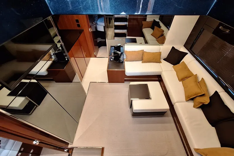  Yacht Photos Pics Luxurious interior of 2022 Riva RIVALE 56 HT yacht with modern seating and decor.