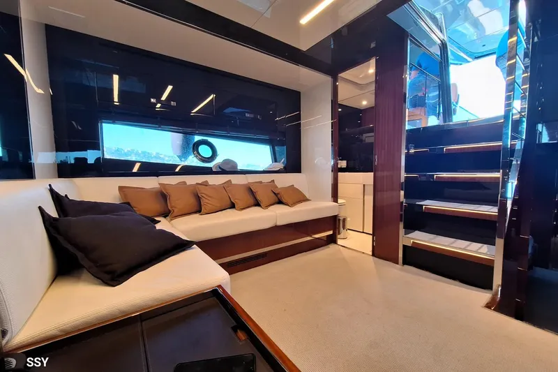 Yacht Photos Pics Luxurious interior of 2022 Riva RIVALE 56 HT yacht with elegant seating and modern design.