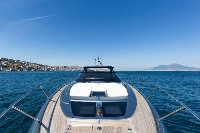  Yacht Photos Pics Luxury Riva RIVALE 56 HT yacht cruising near scenic coastline, 2022 model.