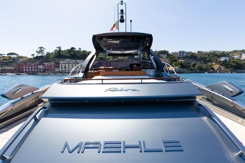  Yacht Photos Pics 2022 Riva RIVALE 56 HT luxury yacht on scenic coastal waters.