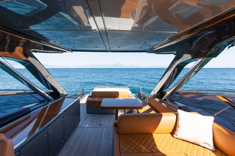  Yacht Photos Pics Luxurious 2022 Riva RIVALE 56 HT yacht interior with ocean view and elegant seating.