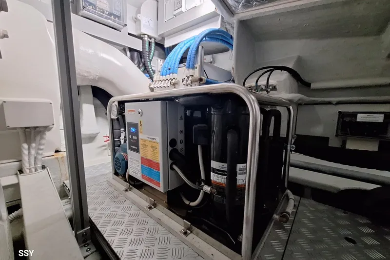  Yacht Photos Pics Engine room of 2022 Riva RIVALE 56 HT yacht, featuring advanced machinery and equipment.