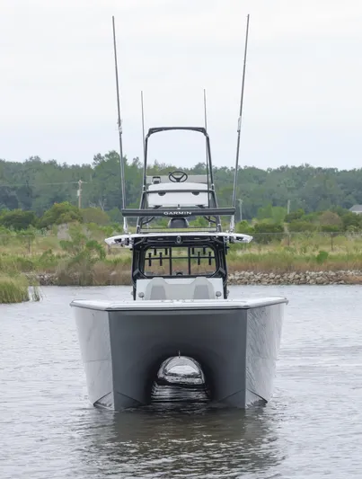 Brand New Yacht Photos Pics 2025 Freeman 42 LR boat on water, front view with lush greenery in background.