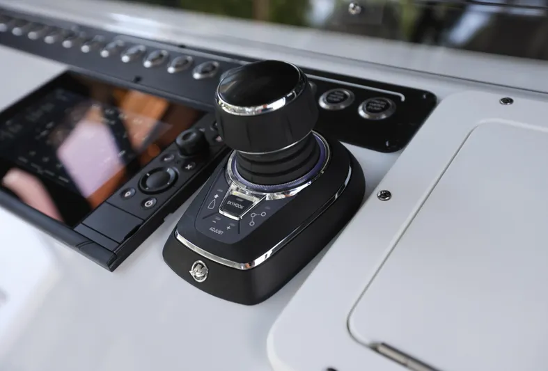 Brand New Yacht Photos Pics Control panel of 2025 Freeman 42 LR boat with joystick and display.