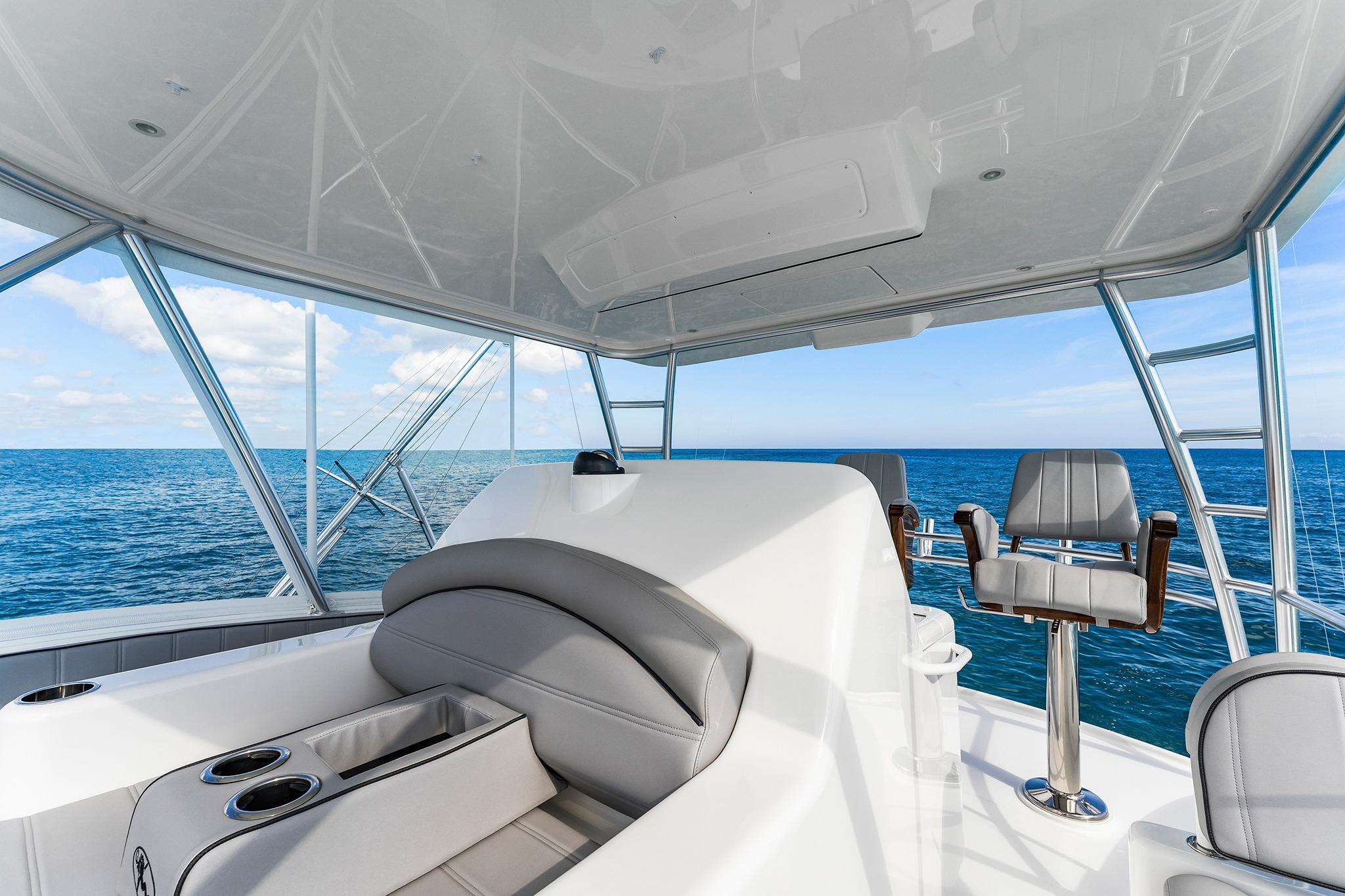Luxurious interior of 2026 Viking 50 Convertible yacht with ocean view.