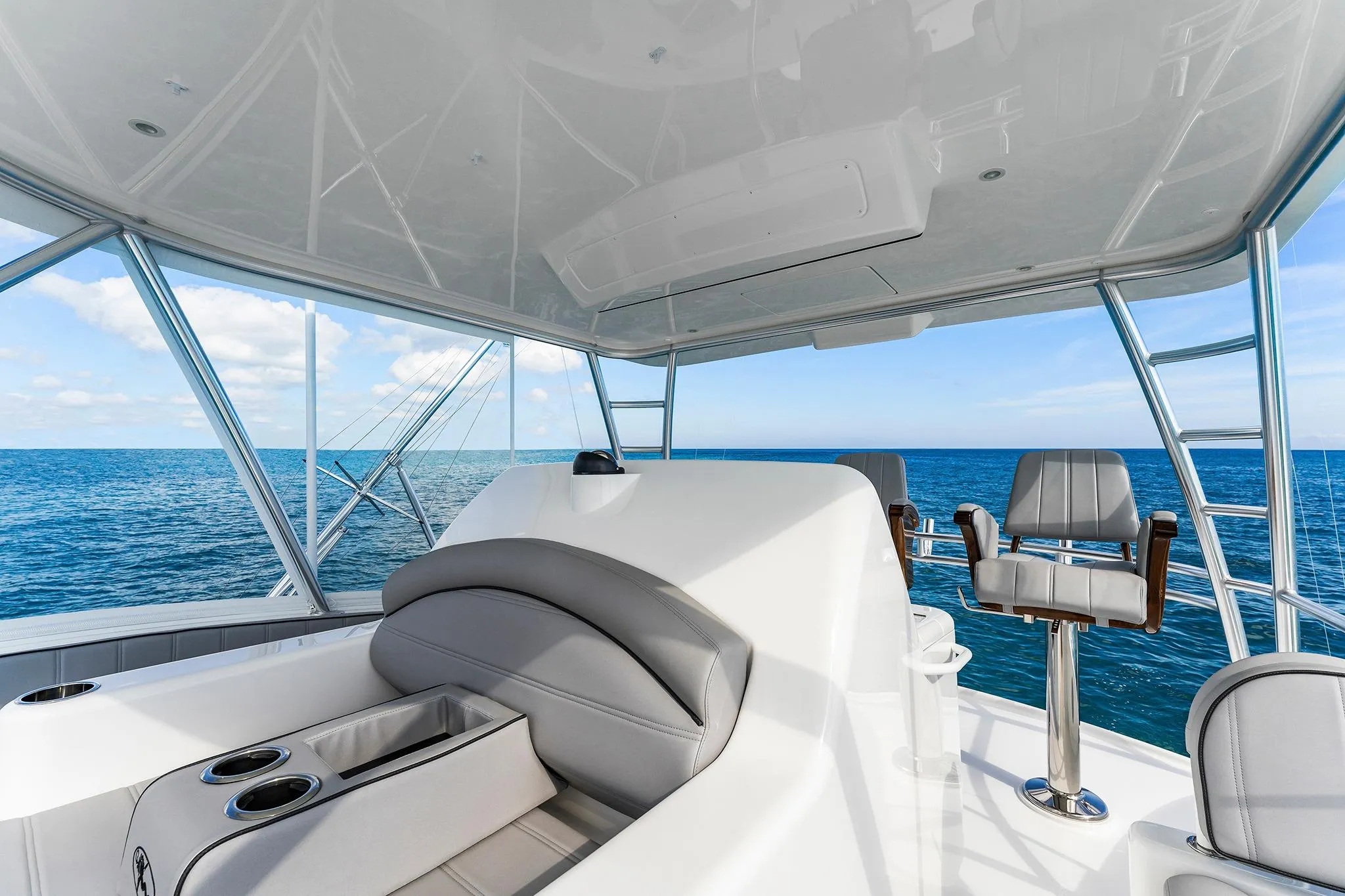 Luxurious interior of 2026 Viking 50 Convertible yacht with ocean view.