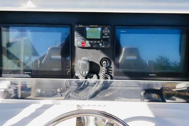  Yacht Photos Pics Control panel of 2019 SeaVee 370Z boat with Garmin displays and communication equipment.