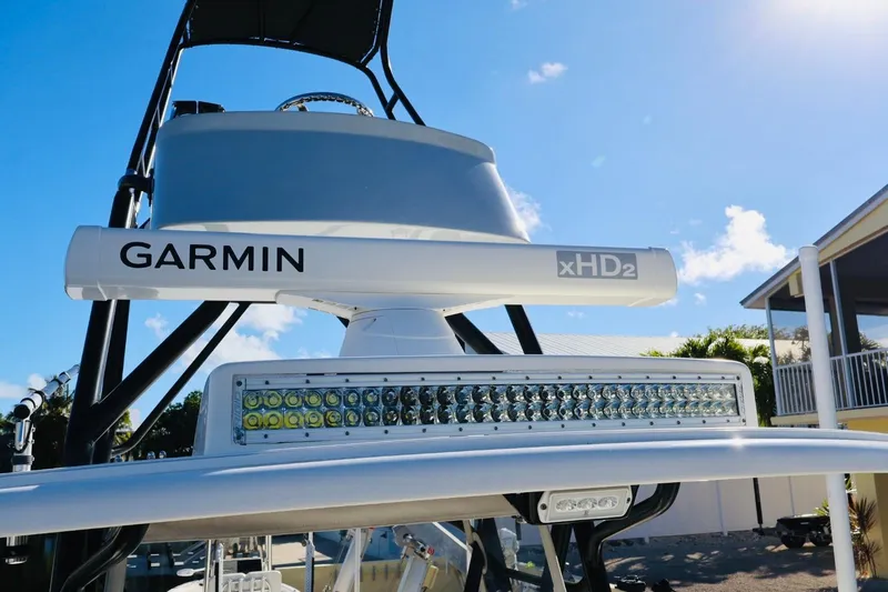  Yacht Photos Pics 2019 SeaVee 370Z boat with Garmin xHD2 radar and LED lights under clear blue sky.