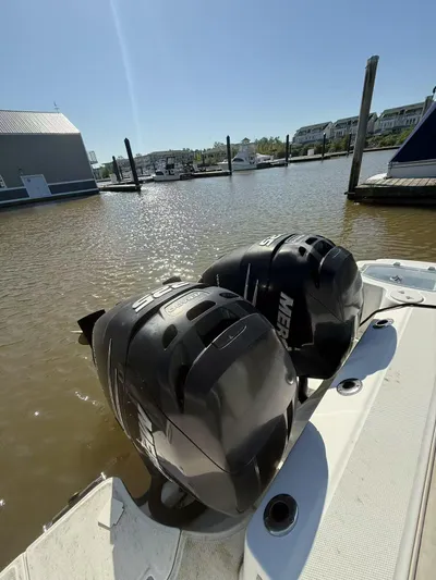 Yacht Photos Pics 2016 Boston Whaler 285 Conquest with dual Mercury outboard engines docked at marina.
