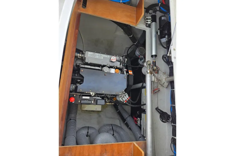 Arias Song Yacht Photos Pics Engine compartment of a 2016 Lagoon 400 S2 catamaran, showcasing mechanical components.