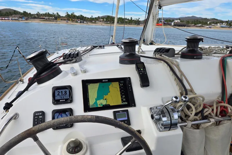 Arias Song Yacht Photos Pics Cockpit of 2016 Lagoon 400 S2 catamaran with navigation equipment and ocean view.