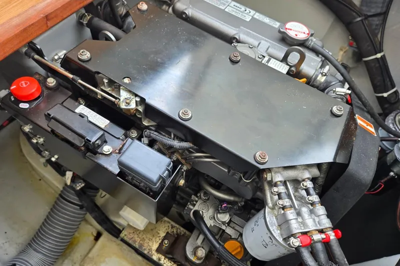 Arias Song Yacht Photos Pics Engine compartment of a 2016 Lagoon 400 S2 catamaran, showcasing mechanical components.