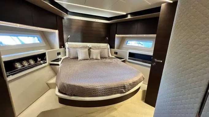  Yacht Photos Pics Luxurious bedroom interior of 2018 Azimut 72 yacht with modern design and elegant bedding.