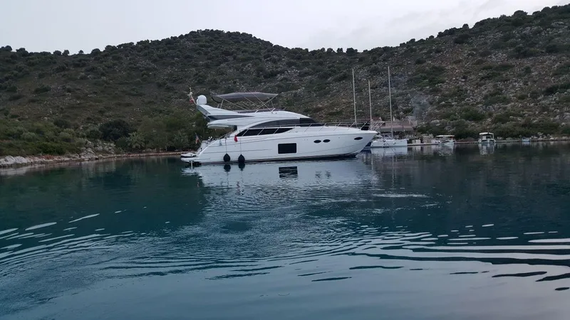  Yacht Photos Pics Luxury yacht Princess 56 from 2016 in a serene bay.